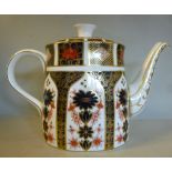 A Royal Crown Derby bone china teapot of oval, tapered form with a cover,