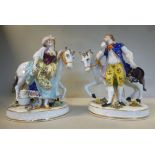 A pair of late 19thC porcelain figures,