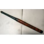 A William IV red, black and green painted wooden nightstick for City of London and the West End,