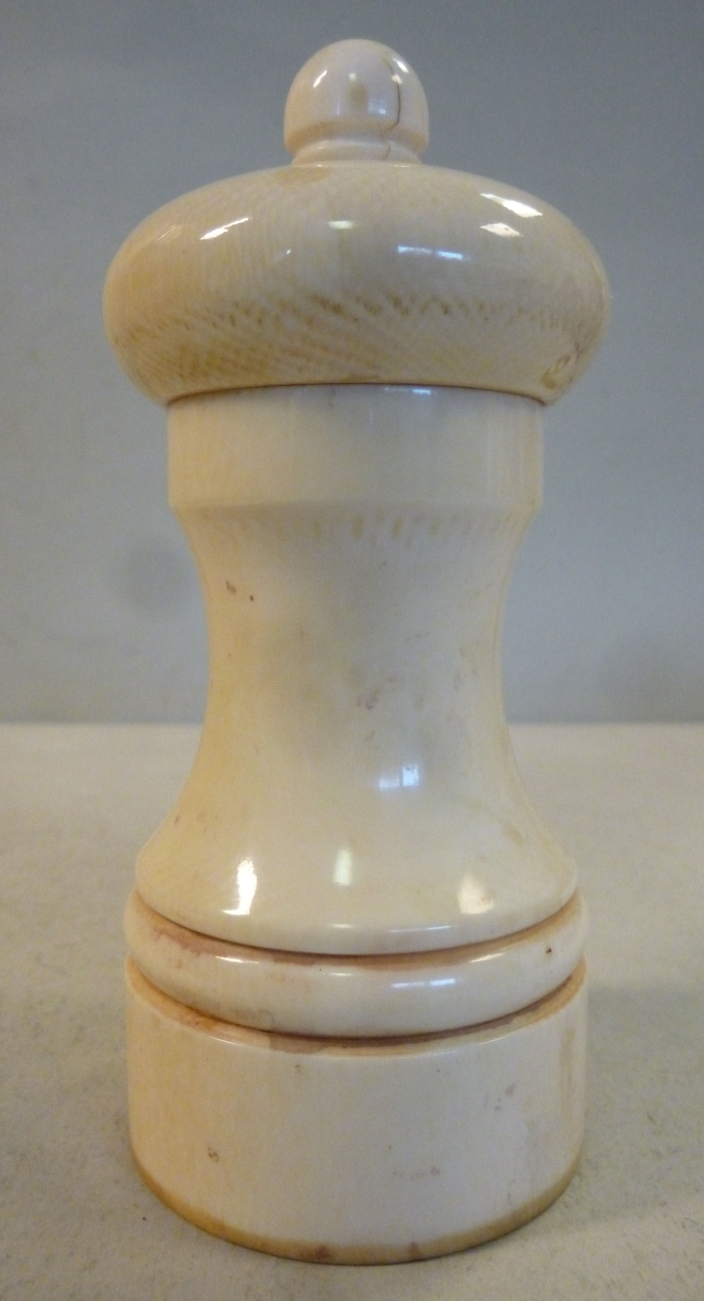 An early 20thC turned ivory pepper mill