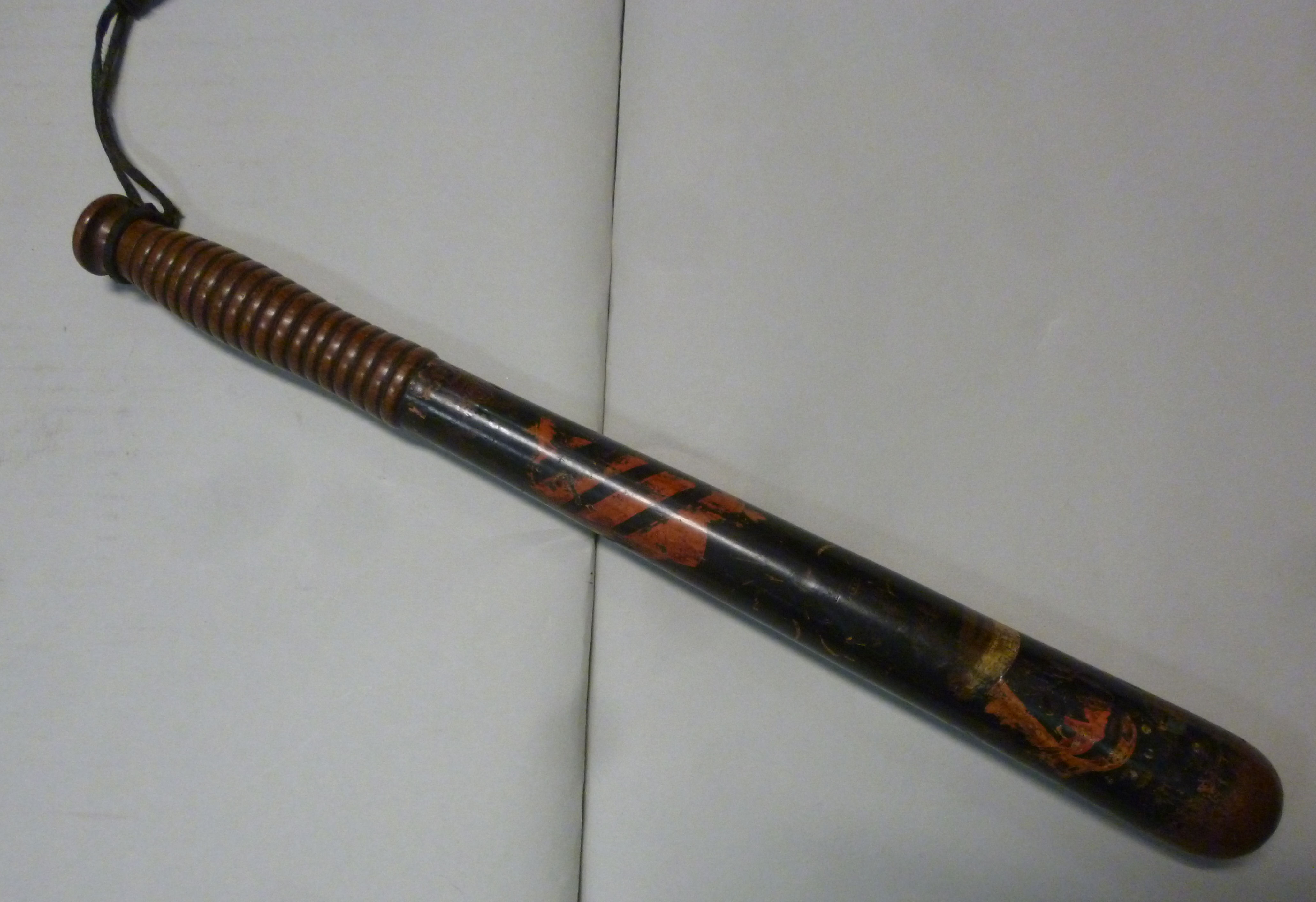 A late 19thC police wooden truncheon, painted in colours on black, impressed PC165, on a ribbed, - Image 2 of 10