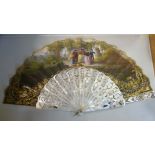 A late 19thC Continental fan with engraved, pierced and gilded mother-of-pearl sticks and guards,