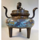 A 19thC Chinese twin handled brass censer with banded enamel ornament,