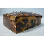 A mid 19thC rivetted tortoiseshell clad ring box with straight sides, a hinged,