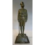 An early 20thC cast bronze figure, a uniformed soldier of the West African Frontier Force,