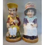 Two early Sarrequemines pottery Toby jugs 'Mr Punch and Judy' bearing impressed marks and