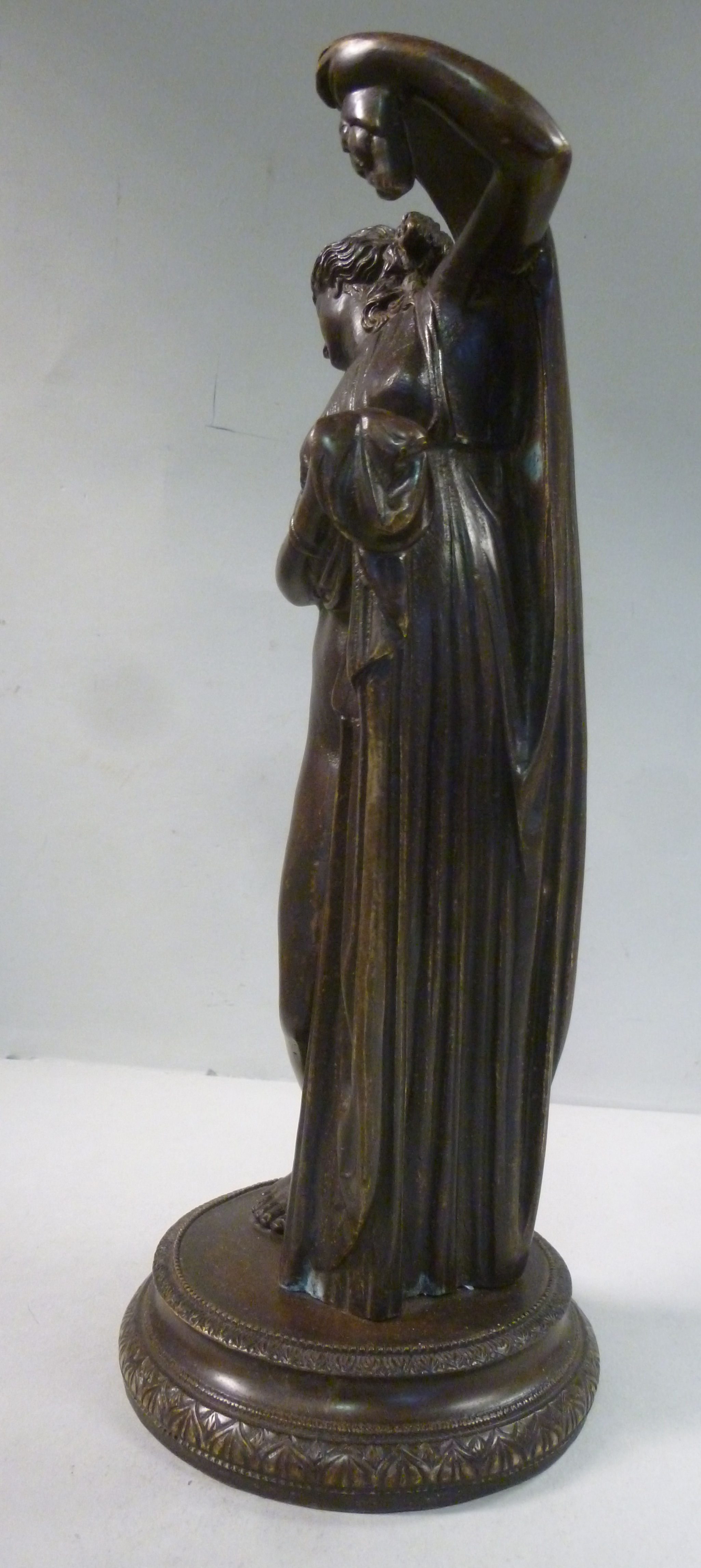 An early 20thC cast and patinated bronze figure, a partially robed, standing classical maiden, - Image 3 of 8