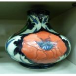 A Moorcroft pottery vase of squat, bulbous form,