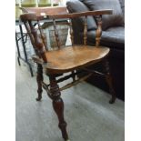 An early 19thC country made honey coloured oak framed dining chair with a pierced splat and solid