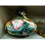 A Moorcroft pottery vase of squat, bulbous form,