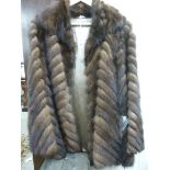 A Nurse of Oxford mink tail fur jacket in geometric style with wide cuffs and a collar RSF