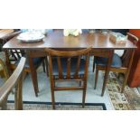 A G-Plan dark stained mahogany, extending dining table, raised on chamfered,