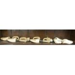 Carved wooden shoe trees, two impressed Churchill,