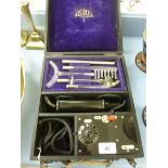 An early 20thC Trojan Violet Ray mains powered electric shock machine,