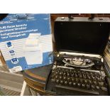 An Olympia and an Adler manual typewriter,