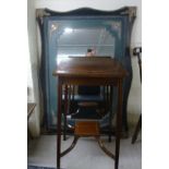 An Edwardian string inlaid mahogany two tier occasional table, raised on square legs 27''h 15.