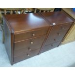 A pair of modern Hulsta mahogany finished four drawer pedestal bedside chests,