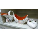 Three items of Crown Devon china, decorated in red,