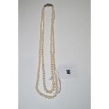 A double row cultured pearl graduated necklace, fitted to a silver and marcasite set clasp.