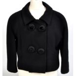 A Givenchy, Paris, black woollen jacket with three-quarter length sleeves,
