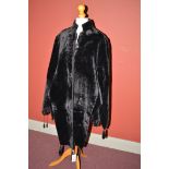 Early 20th Century clothing to include: a black velvet cape,