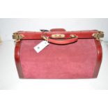 A good quality plum coloured suede and leather Gladstone bag with brass fittings, studs,