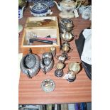 Silver plated trophies; a sugar basin and cream jug; a wooden box of collectables,