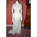 Two mid 20th Century wedding dresses,