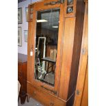 An early 19th Century oak Arts & Crafts wardrobe,