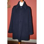 A gentleman's wool mix "Original Montgomery" navy duffel coat,