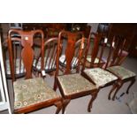 A set of four Queen Anne style mahogany dining chairs,