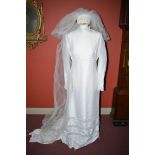 A 1970's Muriel Martin empire line wedding dress, size 10/12,