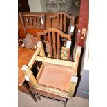 A rustic ladder back rush seated chair; together with a pair of cane seated bedroom chairs;