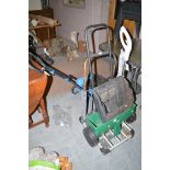 A Vax steam cleaner; a leaf collector; and other garden items.