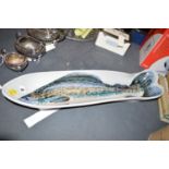 A modern Highland stoneware salmon serving plate with hand-painted decoration.