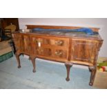 Robson & Sons, Newcastle upon Tyne: an early 20th Century mahogany serpentine front sideboard,