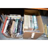 A collection of art books in large format, paperback and others, contained in two boxes.