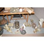 A quantity of cast stone and resin garden ornaments.