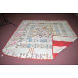 A Victorian floral decorated patchwork quilt, with red and white stripy reverse, 245 x 249cms.
