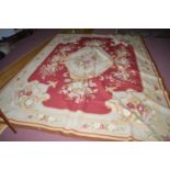 A 19th Century aubusson carpet/wall hanging, with rose and floral decoration to borders and centre,