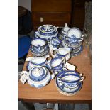 A quantity of Booth's 'Real Old Willow' pattern dinner and tea china.