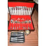 A canteen of stainless steel cutlery; a cased set of six silver handled tea knives;