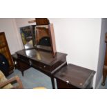 Stag bedroom furniture, to include: headboard; bedside tables; cheval mirror; and a dressing table.