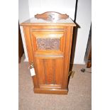 An early 20th Century walnut pot cupboard,