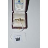 A two stone diamond ring, on 18ct. carat. yellow gold shank, ring size I.