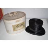 An "Extra Light Consolidated" brushed silk top hat, with box bearing shop labels,