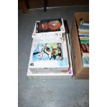 A Wii Fit; and a boxed Wii Sport; together with nine games.