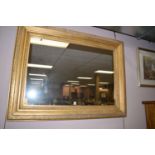 A 19th Century rectangular wall mirror within a gilt wood frame,