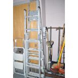 Two sets of aluminium ladders.