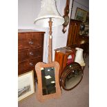A Far Eastern carved wood standard lamp,